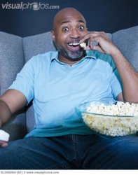 man_eating_popcorn_entertainment.jpg